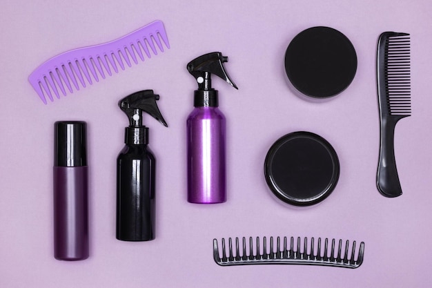 Different hair care and styling products with combs layout. top
view, flat lay