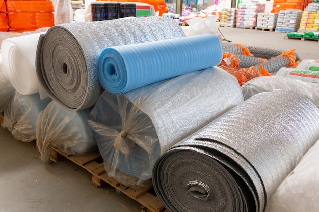 Different Insulation material in rolls for sale on a store warehouse