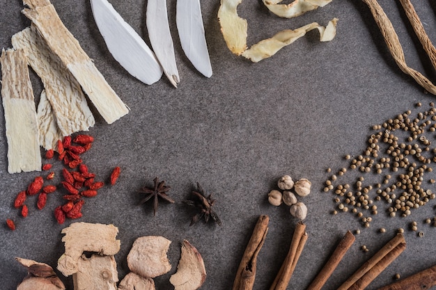 Different kind of Chinese herbal on old background