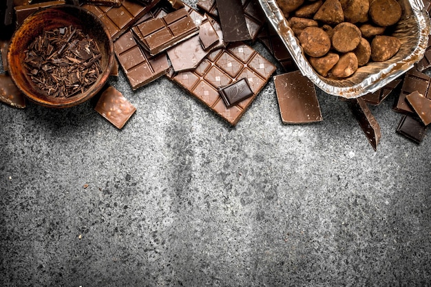 Different kinds of chocolate in bowls   