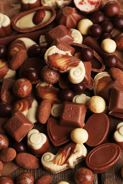 Different kinds of chocolates close-up background