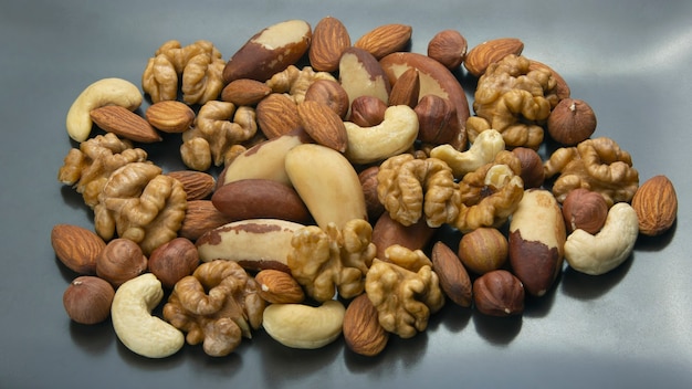 Photo different kinds of nuts. healthy and protein food