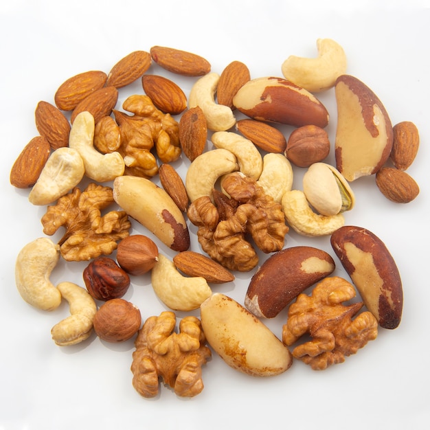 Different nuts on a white background. protein and healthy food