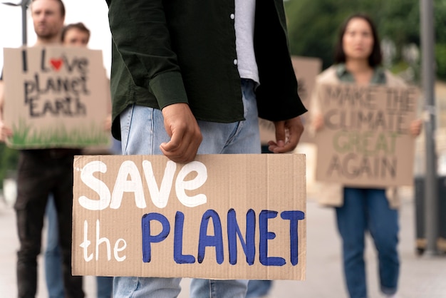 Different people marching in climate change protest