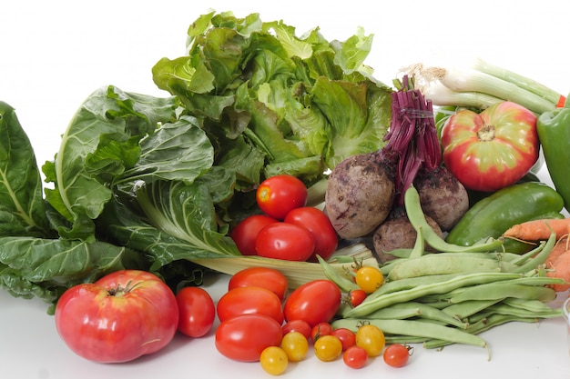 Different seasonal vegetables on white