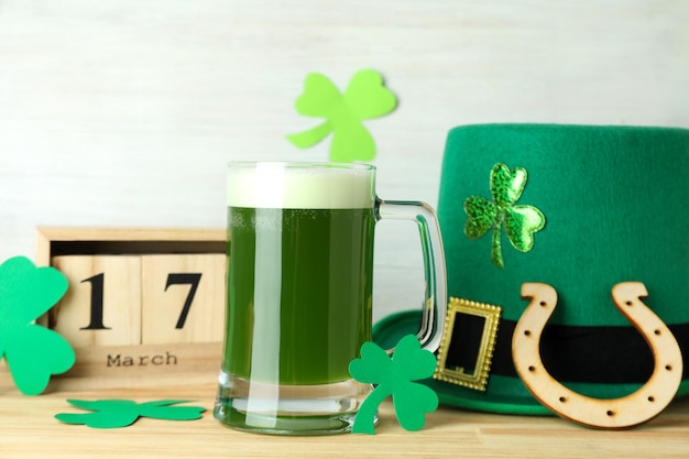 Different St.Patrick's Day accessories on wooden table