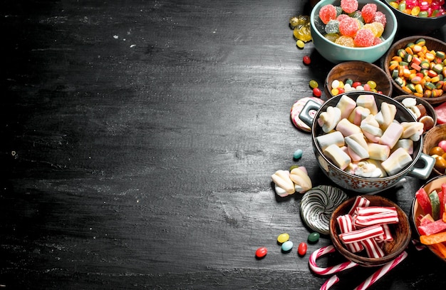 Different sweet candy, jelly and candied in a bowl.