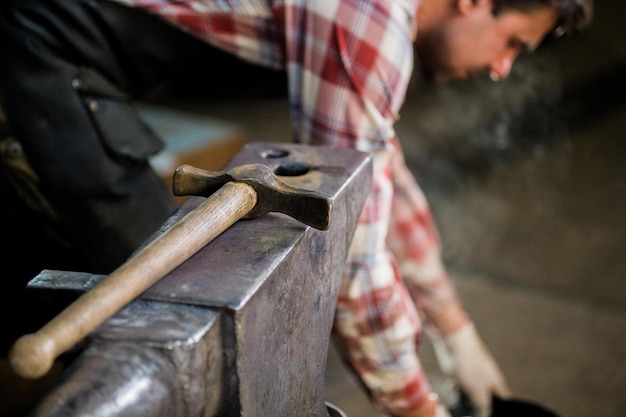 The different tools lies on anvil at forge