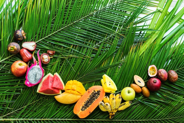 Different Tropical Fruits Raw Eating Diet Concept