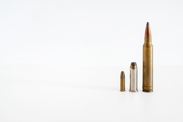 Photo different type of bullets isolated over a white background