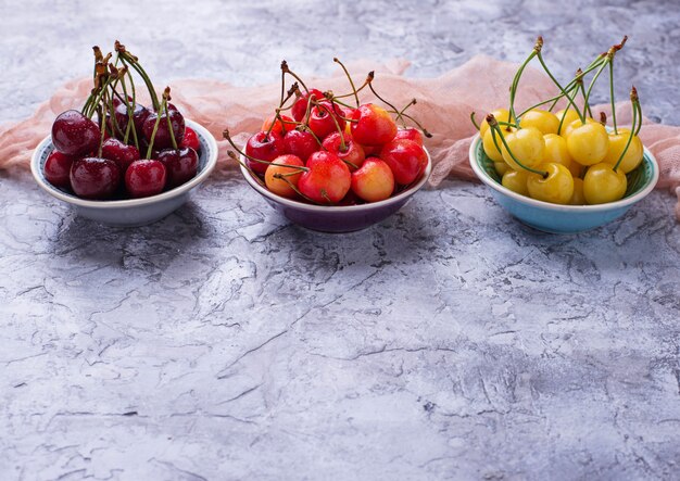 Different type of colorful cherries. Selective focus