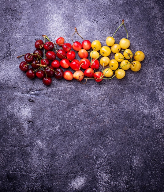 Different type of colorful cherries. Selective focus