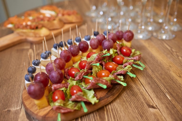 Different types of canapes on buffet table