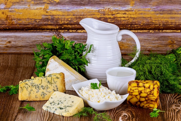 Different types of dairy product cheese, milk and cottage cheese