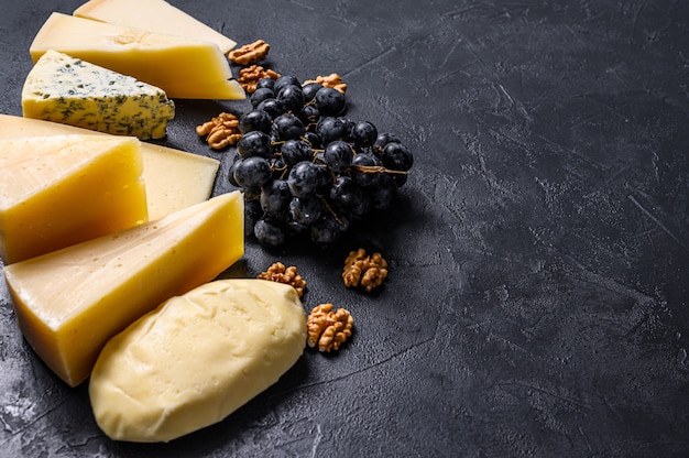 Different types of delicious cheese background