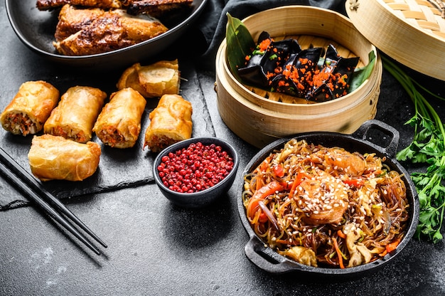 Different types of food on a black table