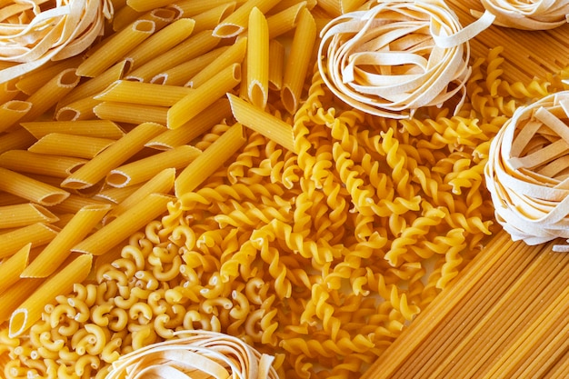 different types and forms of italian dried pasta