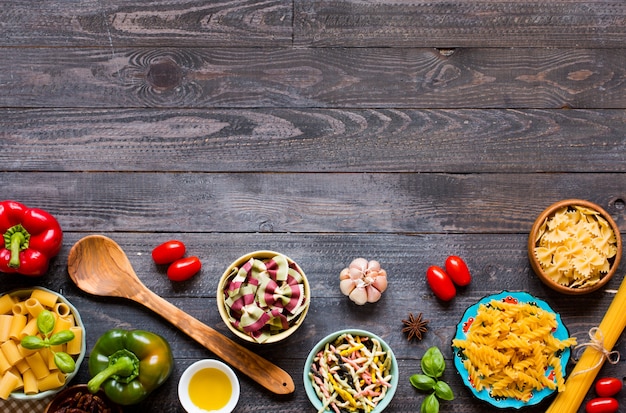 Different types of pasta with various types of vegetables, health 