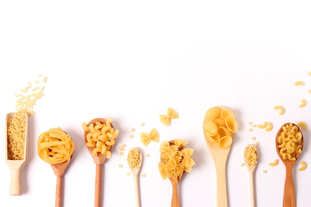 Different types of raw italian pasta closeup