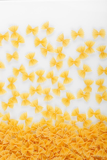 Different types and shapes of dry italian pasta closeup