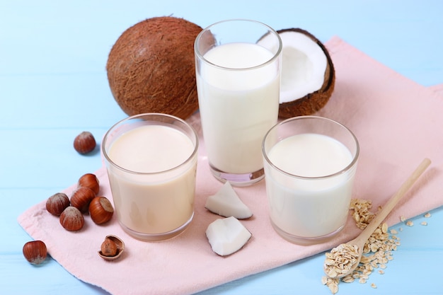 Different types of vegetable milk on the table