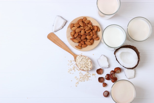 Different types of vegetable milk on the table