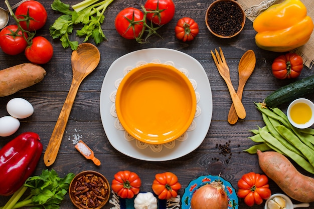 Different types of vegetables, on old wooden table