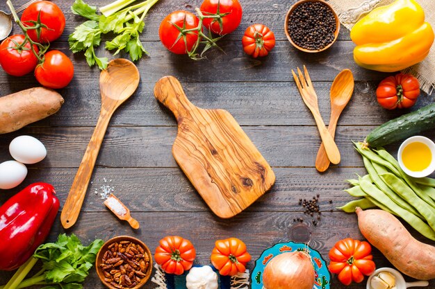 Different types of vegetables, on a old wooden table