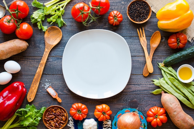 Different types of vegetables, on a old wooden table