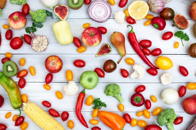 Different vegetables and fruits on a wooden.