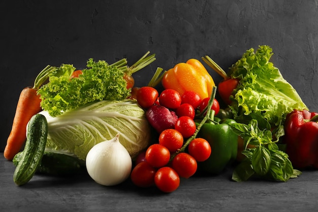 Premium Photo | Different vegetables on grey background