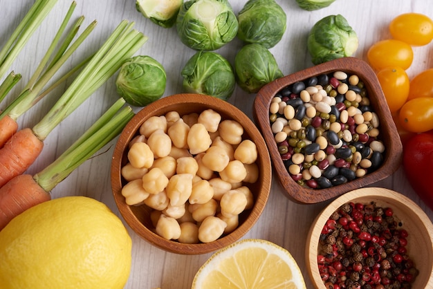 Different vegetables, seeds and fruits on table. Flat-lay, top view.