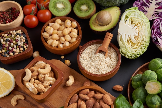 Different vegetables, seeds and fruits on table. Flat-lay, top view.