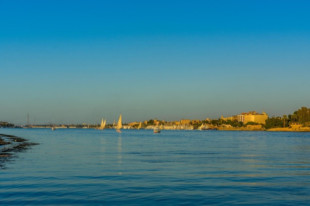 Different vessels on the Nile river in Luxor Egypt