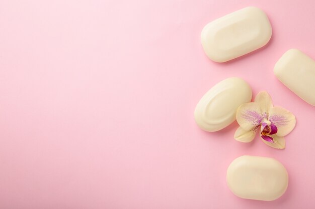 Different white soaps with flower