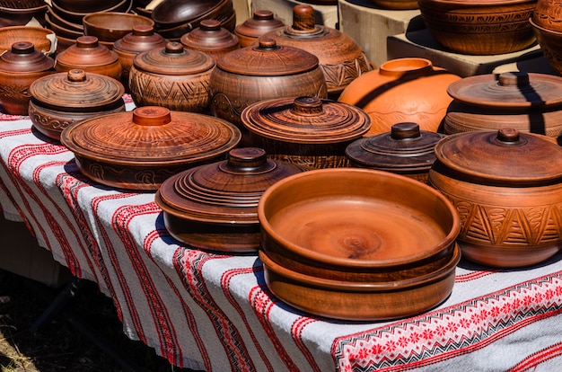 Different wooden pots for sale on a peasant fair