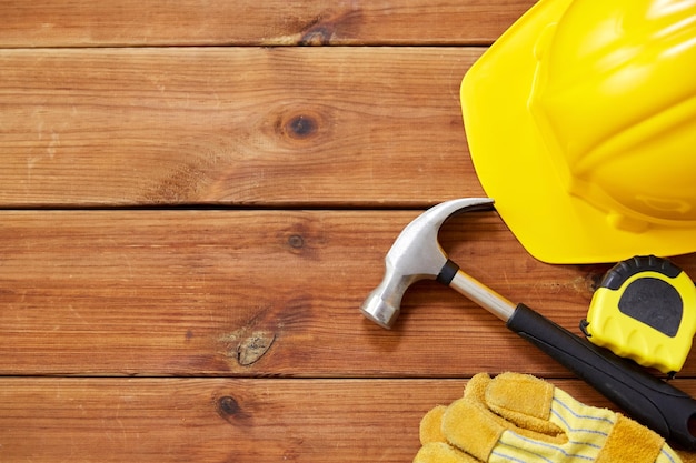 different work tools on wooden boards