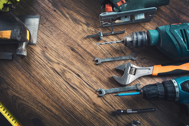 Different working tools on the table background