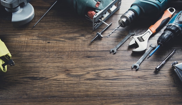 Different working tools on the table background