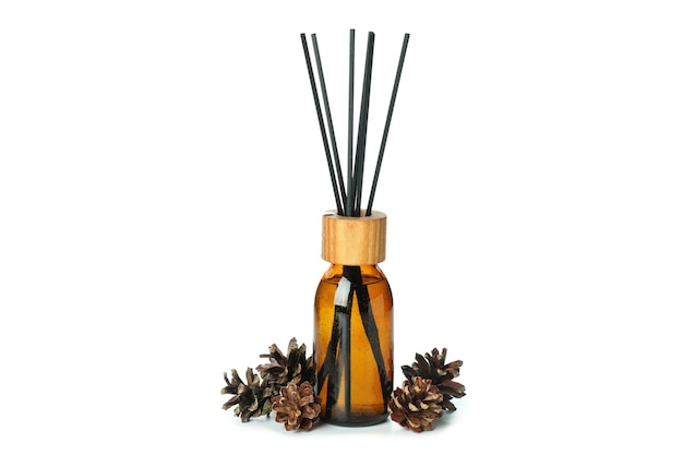 Diffuser bottle with sticks and cones isolated on white background