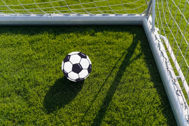 Digitaal pixelkunsteffect van voetbal in het net
