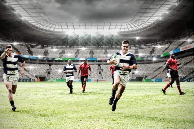 Digitaal samengesteld beeld van team van rugbyspelers die rugby spelen in sportstadion