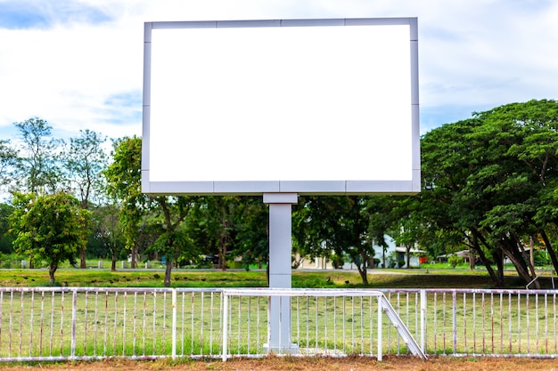 Digital blank scoreboard at football stadium with running track in outdoor