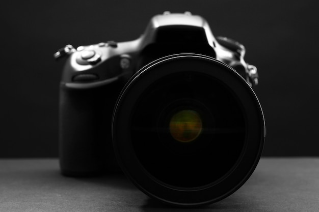 Digital camera on dark background