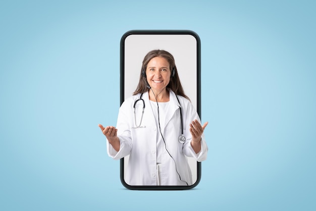 Digital chronic disease management cheerful senior woman doctor talking and gesturing looking from