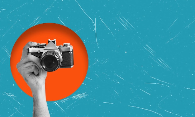 digital collage showing a hand holding a vintage film camera the concept of photography as a hobby