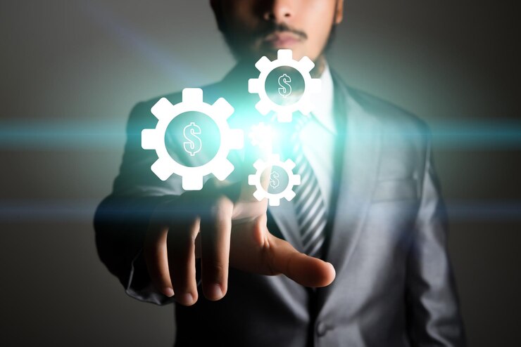 फोटो digital composite image of businessman operating icons against gray background