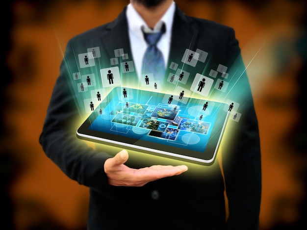 Photo digital composite image of businessman with digital tablet