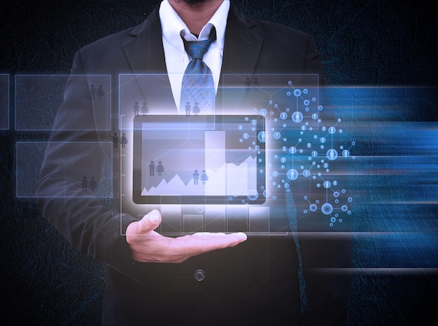 digital composite image of businessman with digital tablet