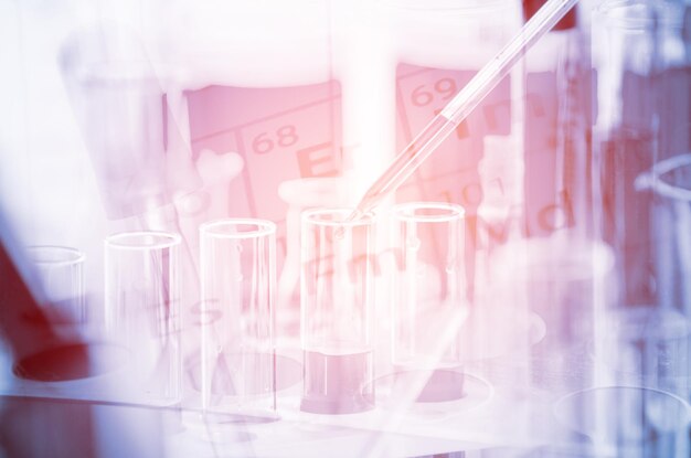 Photo digital composite image of chemicals in test tubes and microscope at laboratory